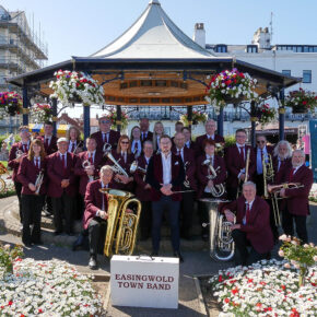 Easingwold Town Band, at Filey Band Stand in 2024.